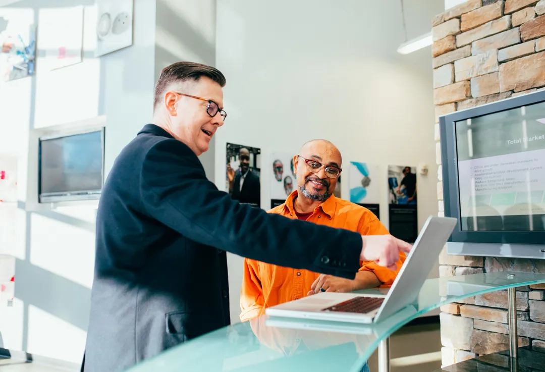 A business owner confidently reviewing a report, in command rather than confused